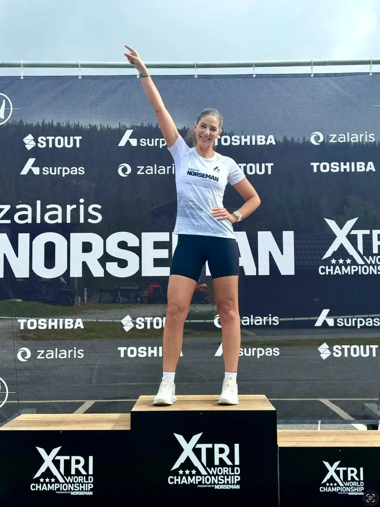 Frankie Forzoni on the Norseman Xtreme Triathlon finish podium