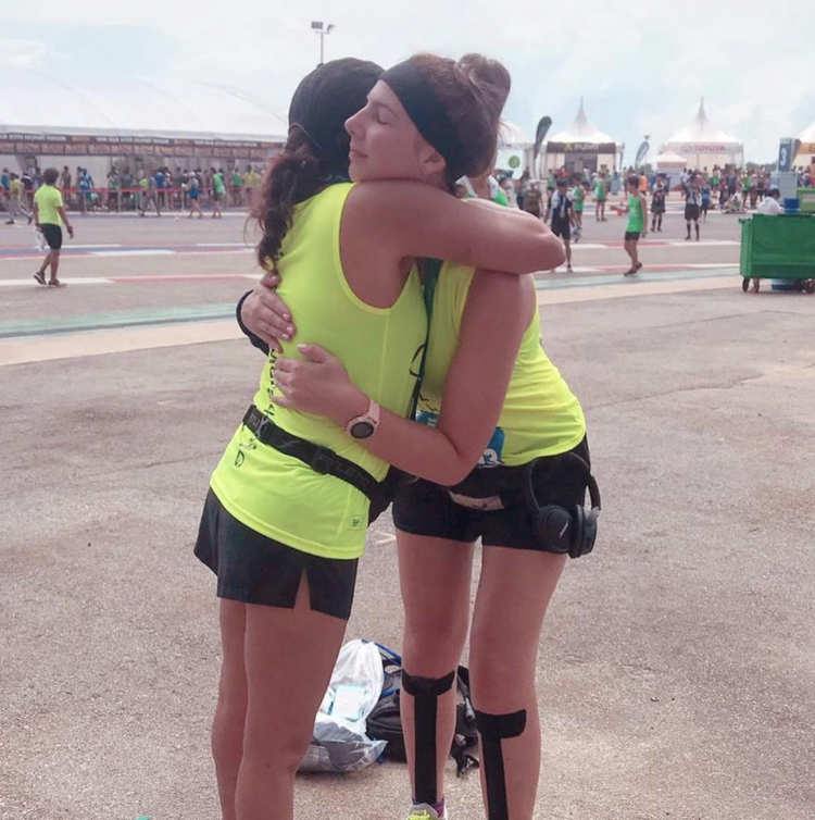 Frankie with a runner from the 2018 Mind Over Marathon free coaching group, Singapore