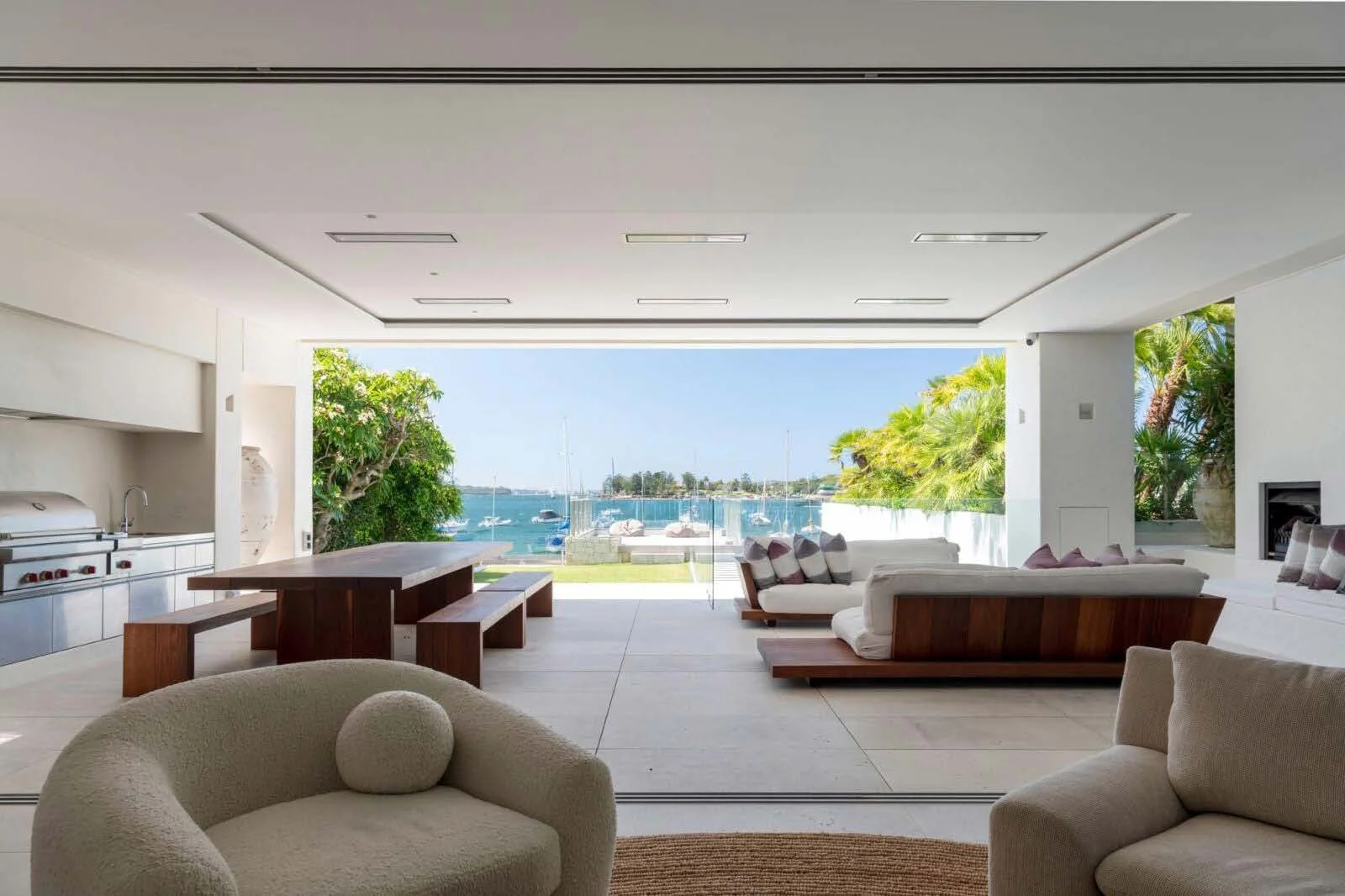 Platinum Electric Marine heaters recessed into the white ceiling of a waterside lounge