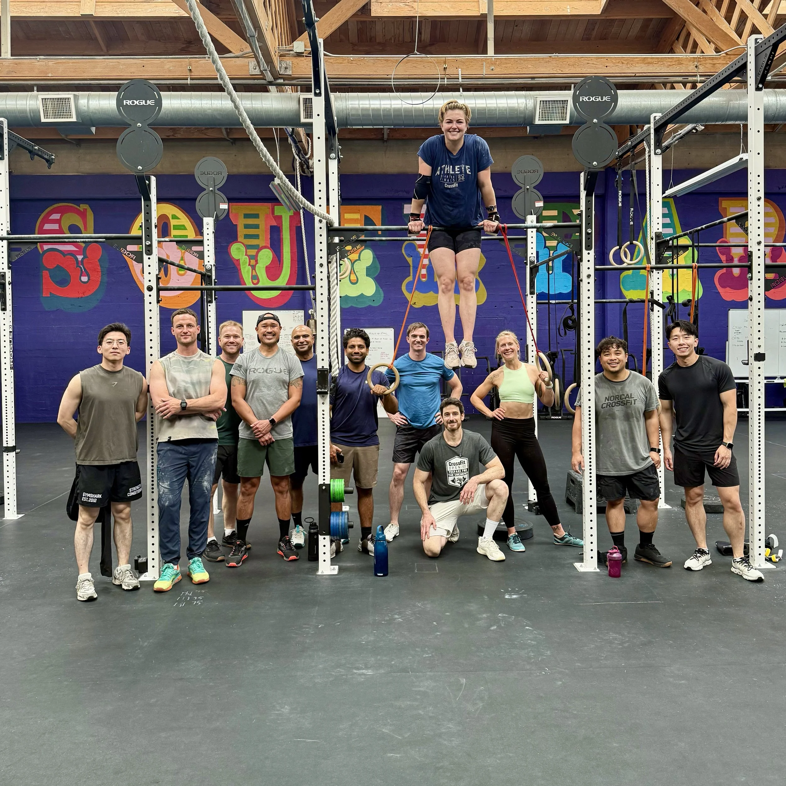 Athletes training muscle-ups with Coach Liran at CrossFit South Park
