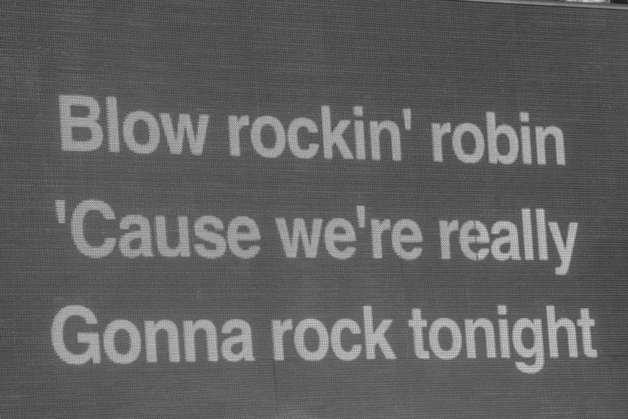 Rockin Robin lyrics displayed on a screen during BK Loves MJ