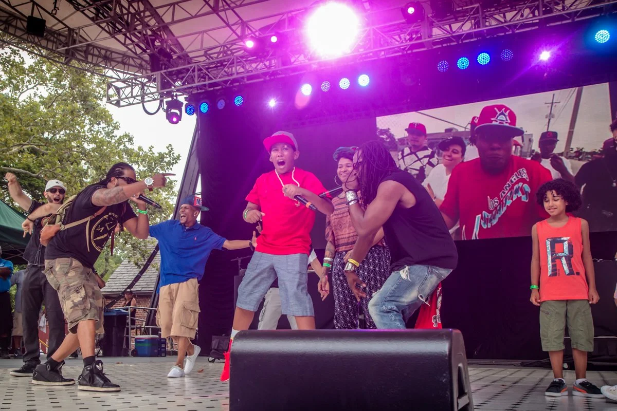 Pumpkinhead's son performs during a tribute as family, friends and members of the hip-hop community support him onstage.
