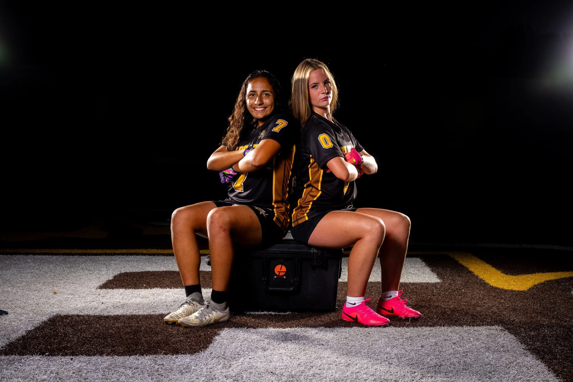 Two El Camino Wildcats flag football athletes photographed together