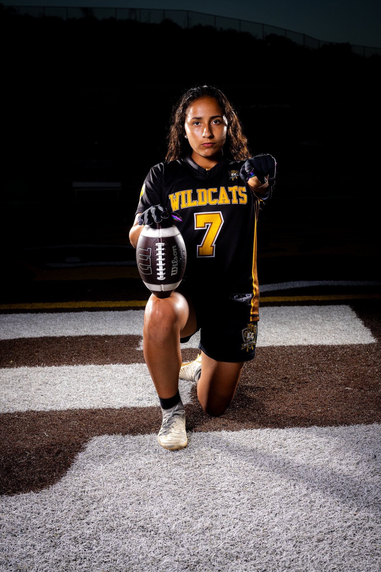 El Camino Wildcats flag football athlete kneeling portrait