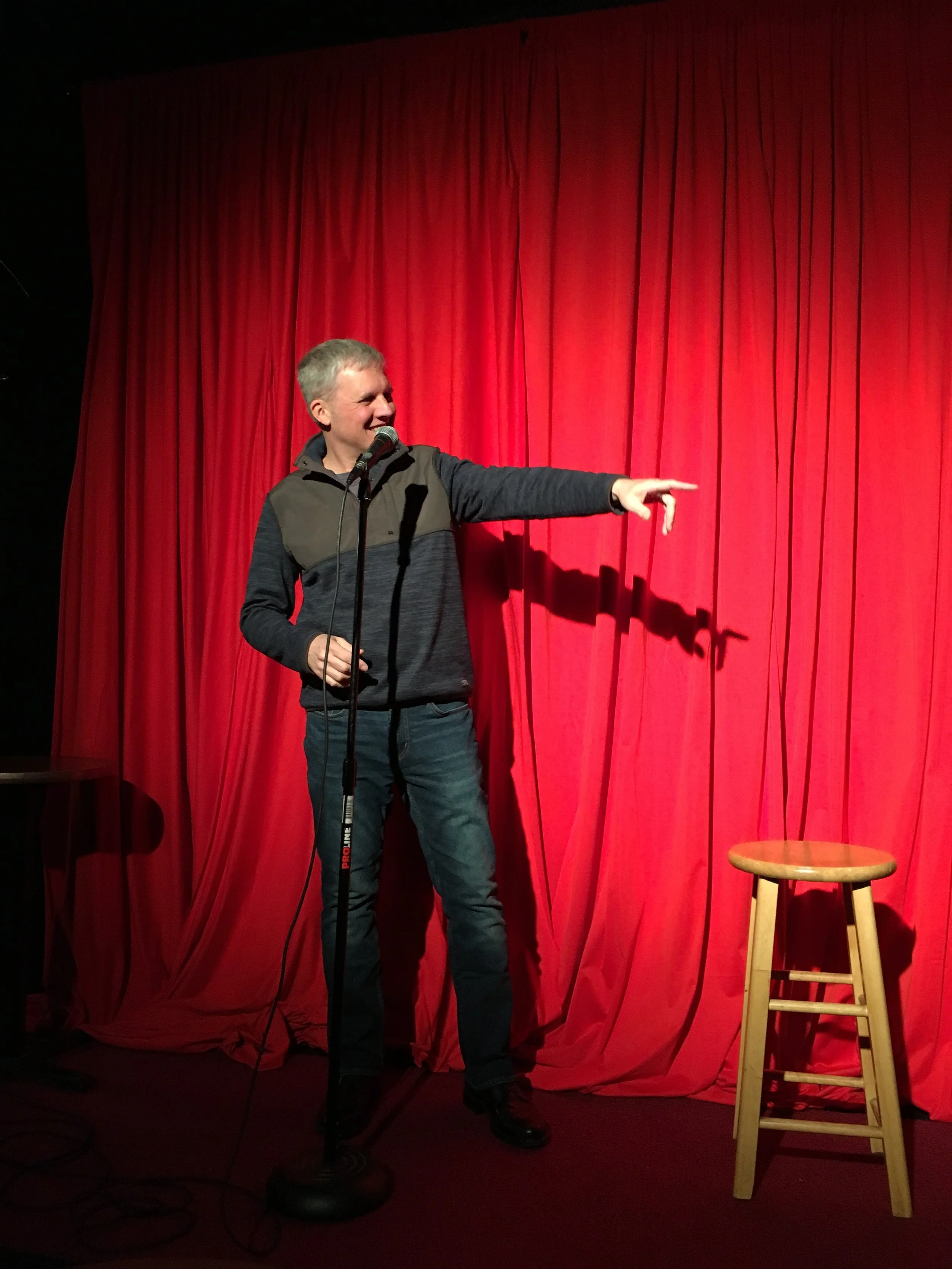 Chuck Kelleher speaking on stage