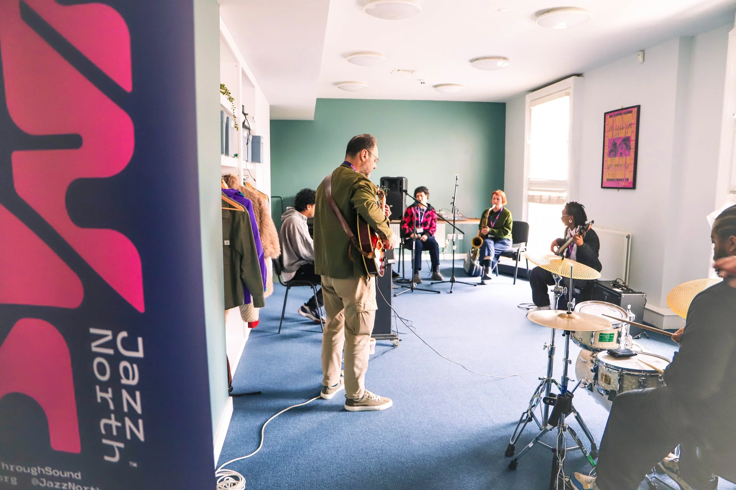 musicians playing in a room