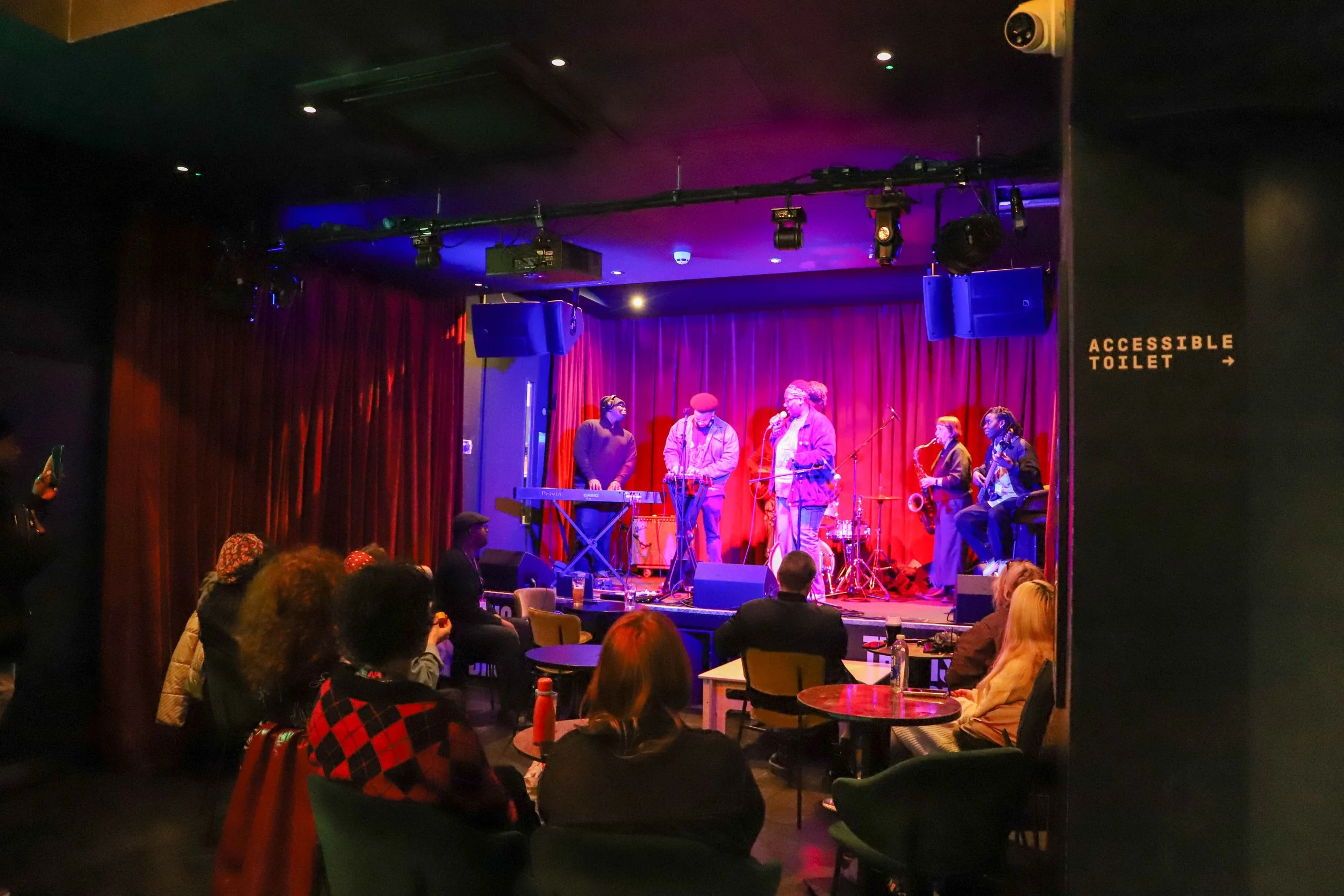 musicians playing in a room