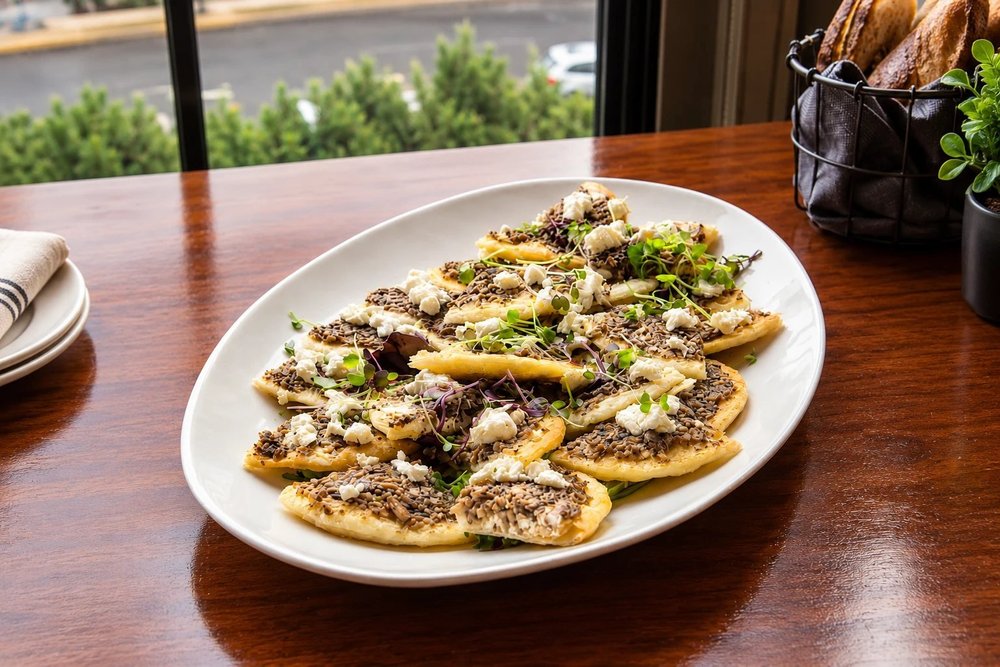 Mushroom goat cheese flatbread with microgreens