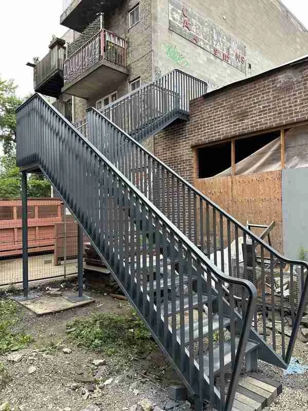 Electrostatic staircase refinishing project by Eagle Crest Painting