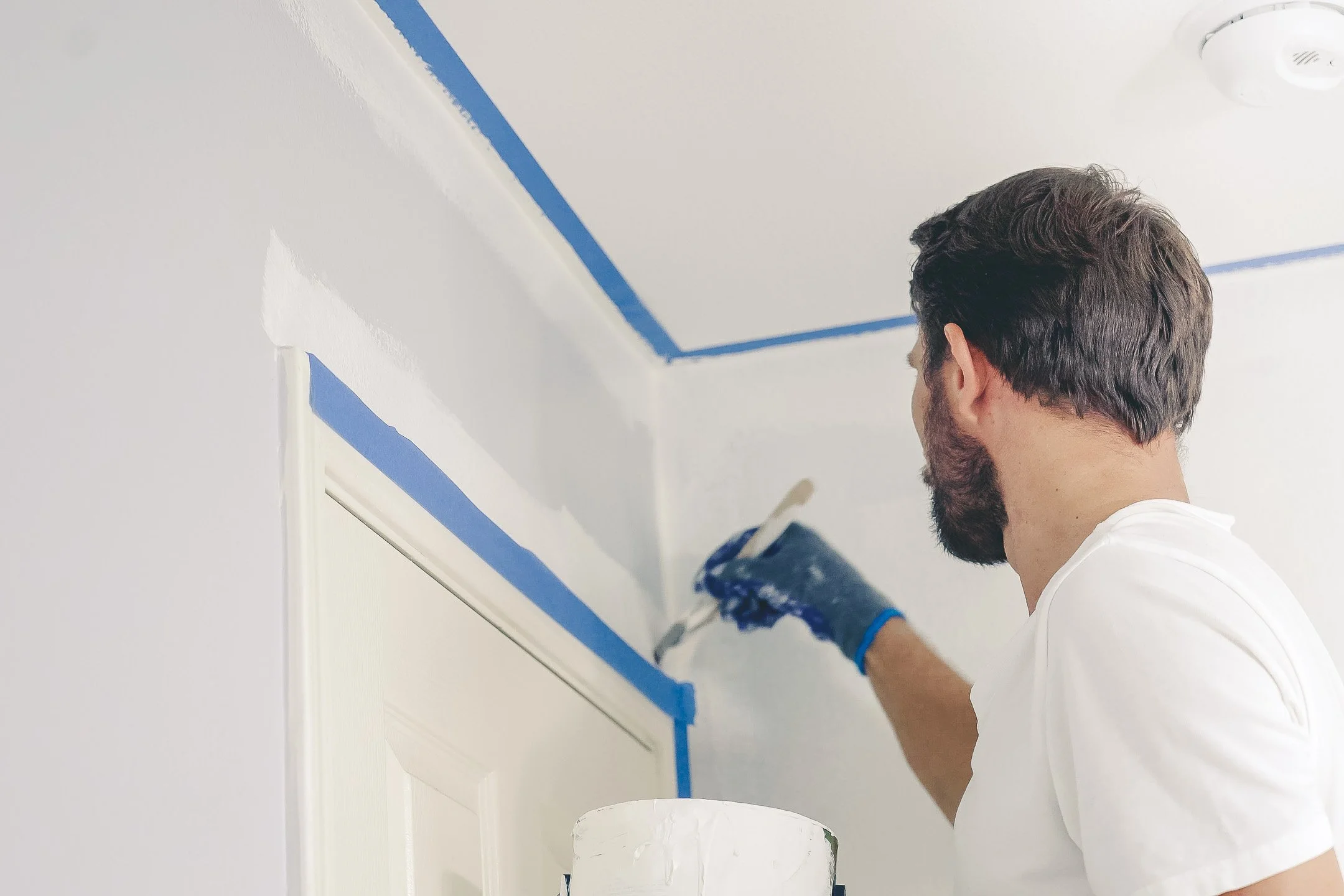 Professional residential painter completing an interior home painting project in Barrie, Ontario