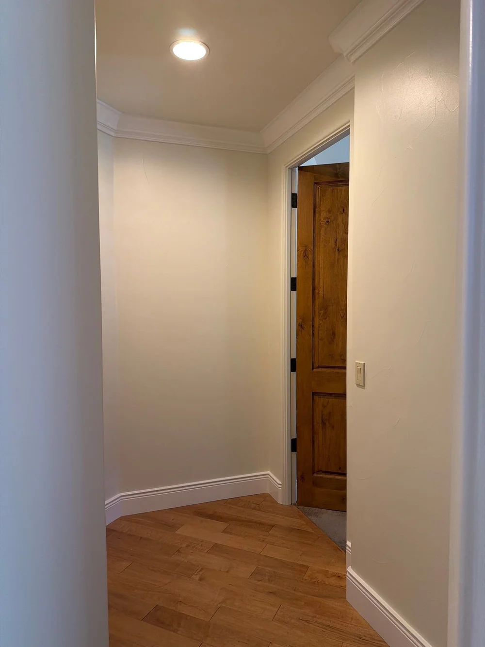 Finished hallway walls, ceiling and crown molding in a South Reno home