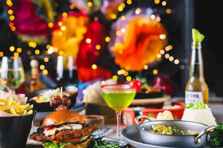 Festive plates and cocktails at Las Iguanas.