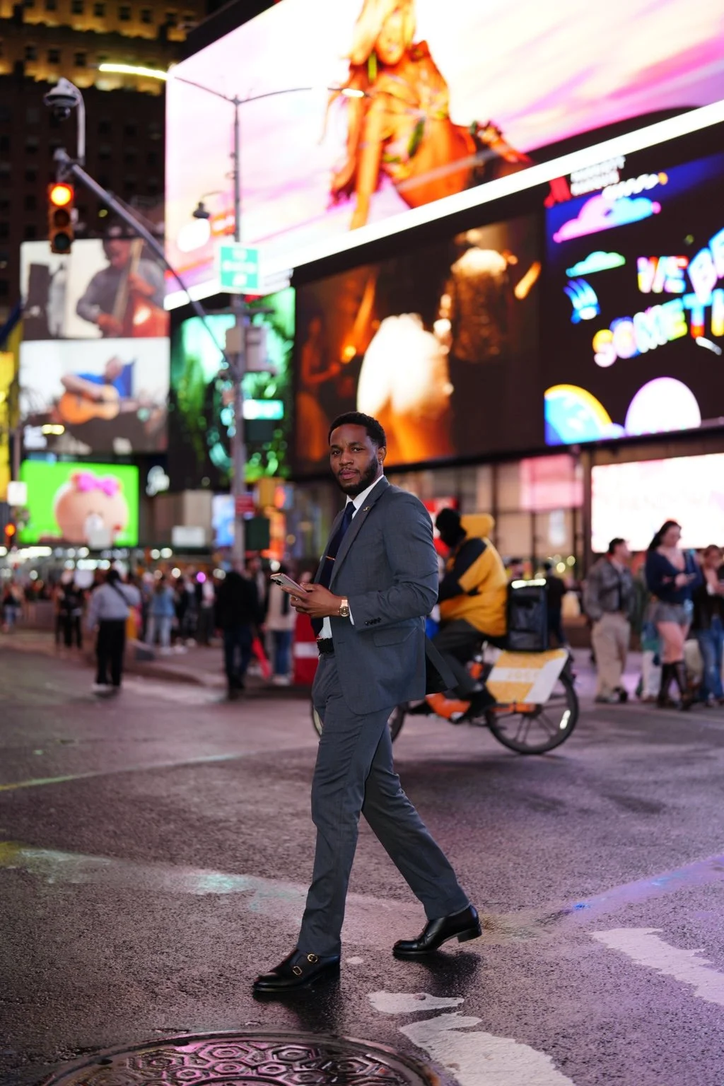 Randy C. Paschal in a suit in Times Square, New York