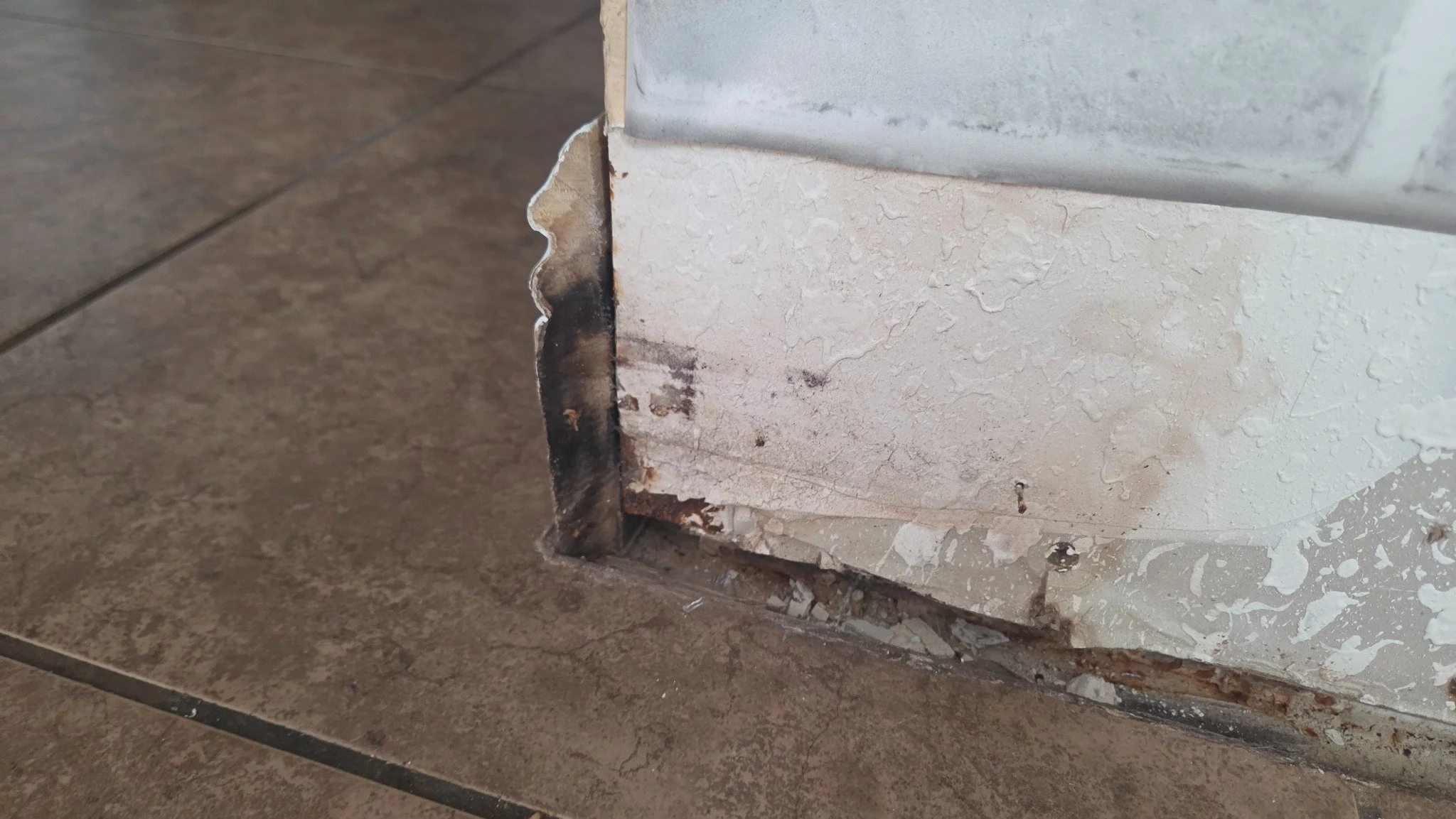 Discoloration along a lower wall during a Pembroke Pines mold assessment