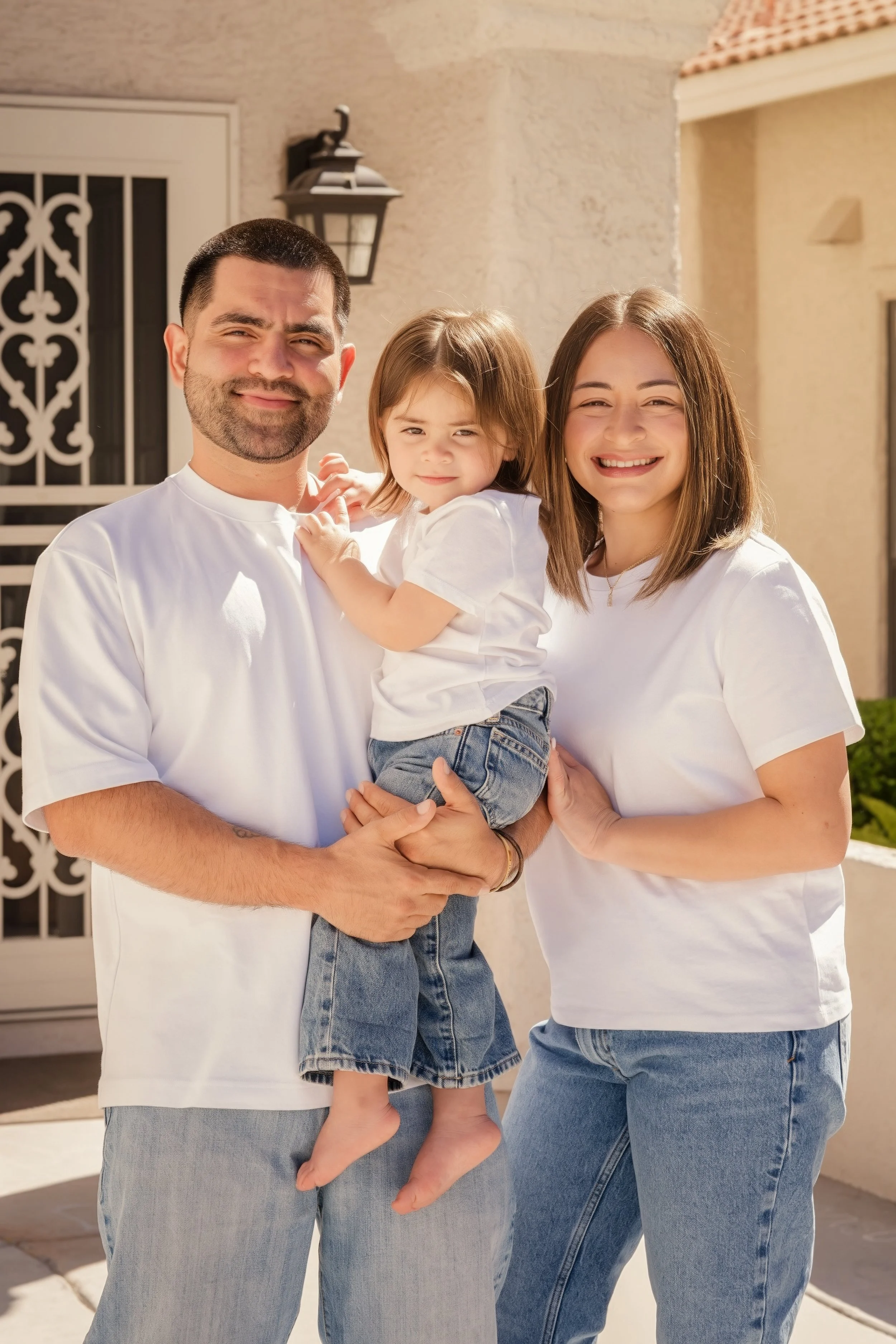 Family standing outside their home in Las Vegas.