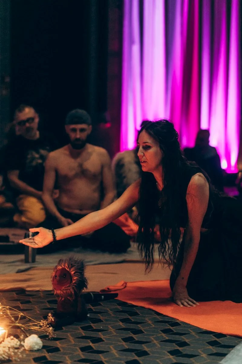 A facilitator leading a ceremony, from a past edition.
