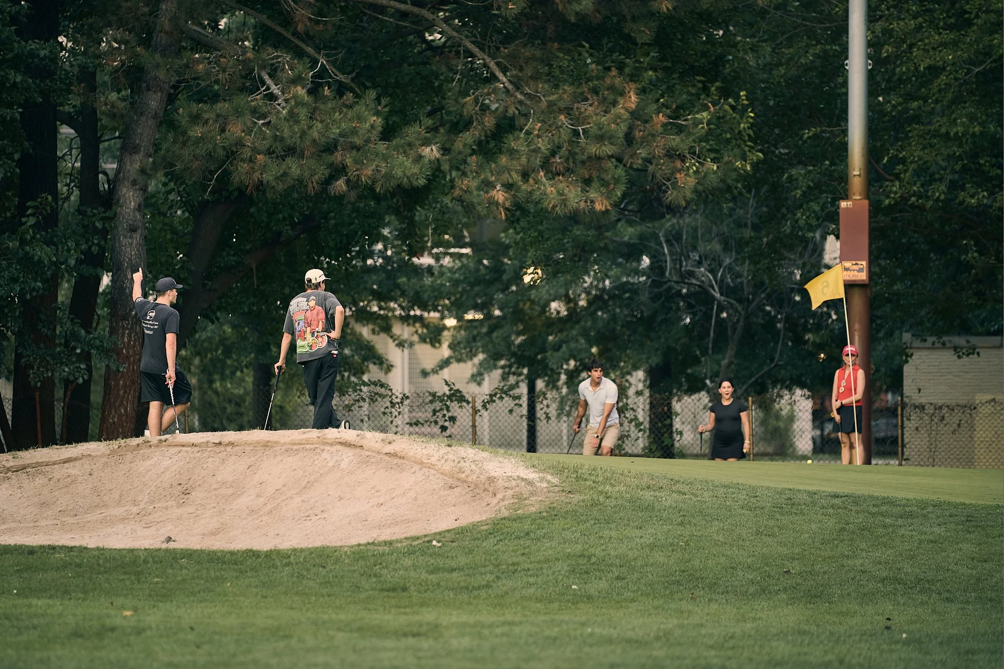 Putting under the lights at Flushing Meadows