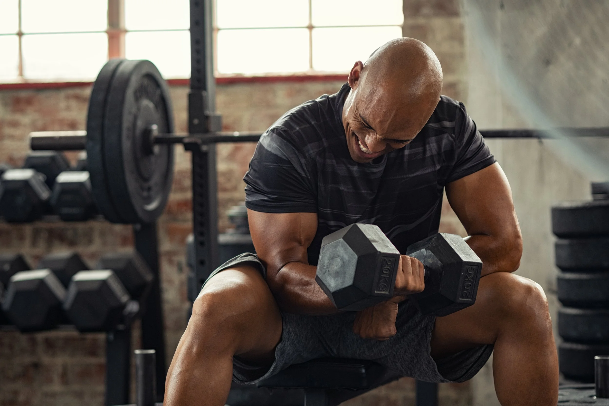 Man strength training after TRT — men's health and testosterone therapy in the Finger Lakes, NY