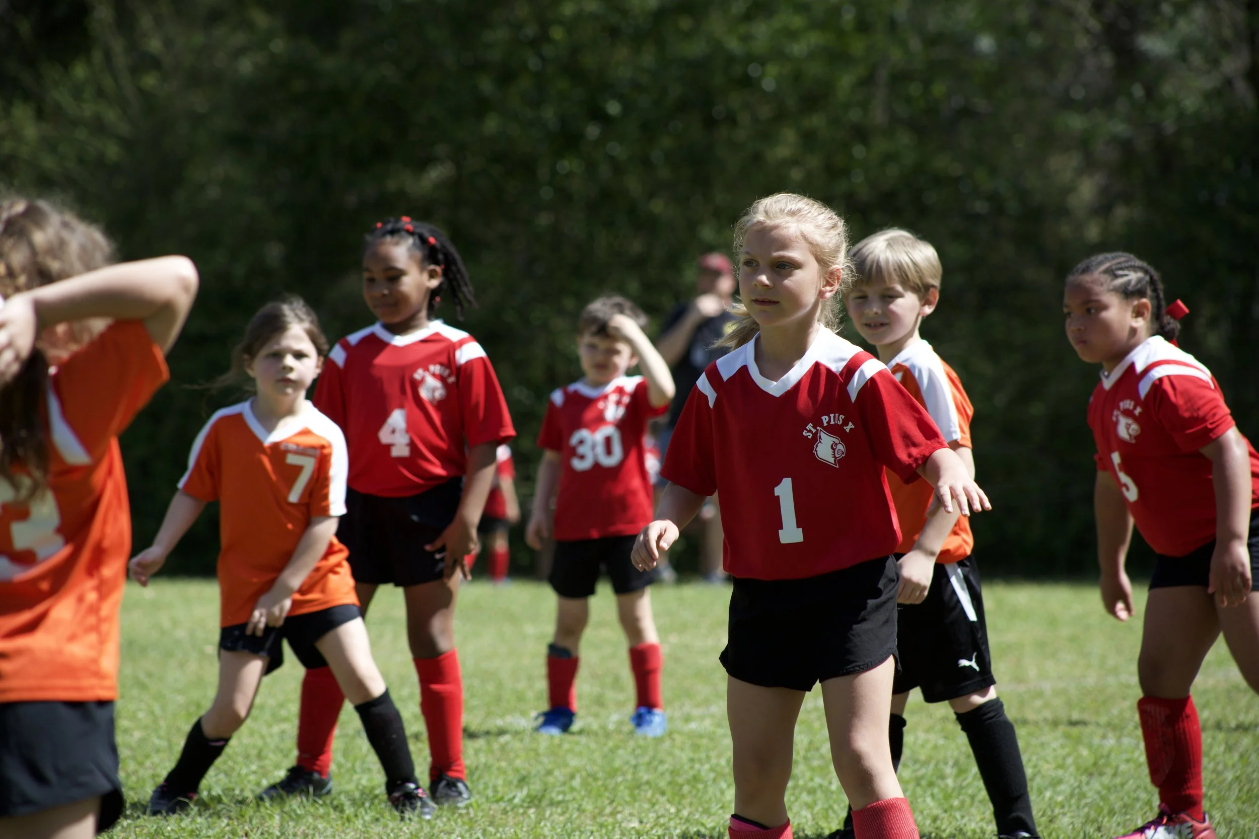 St. Pius X students playing soccer