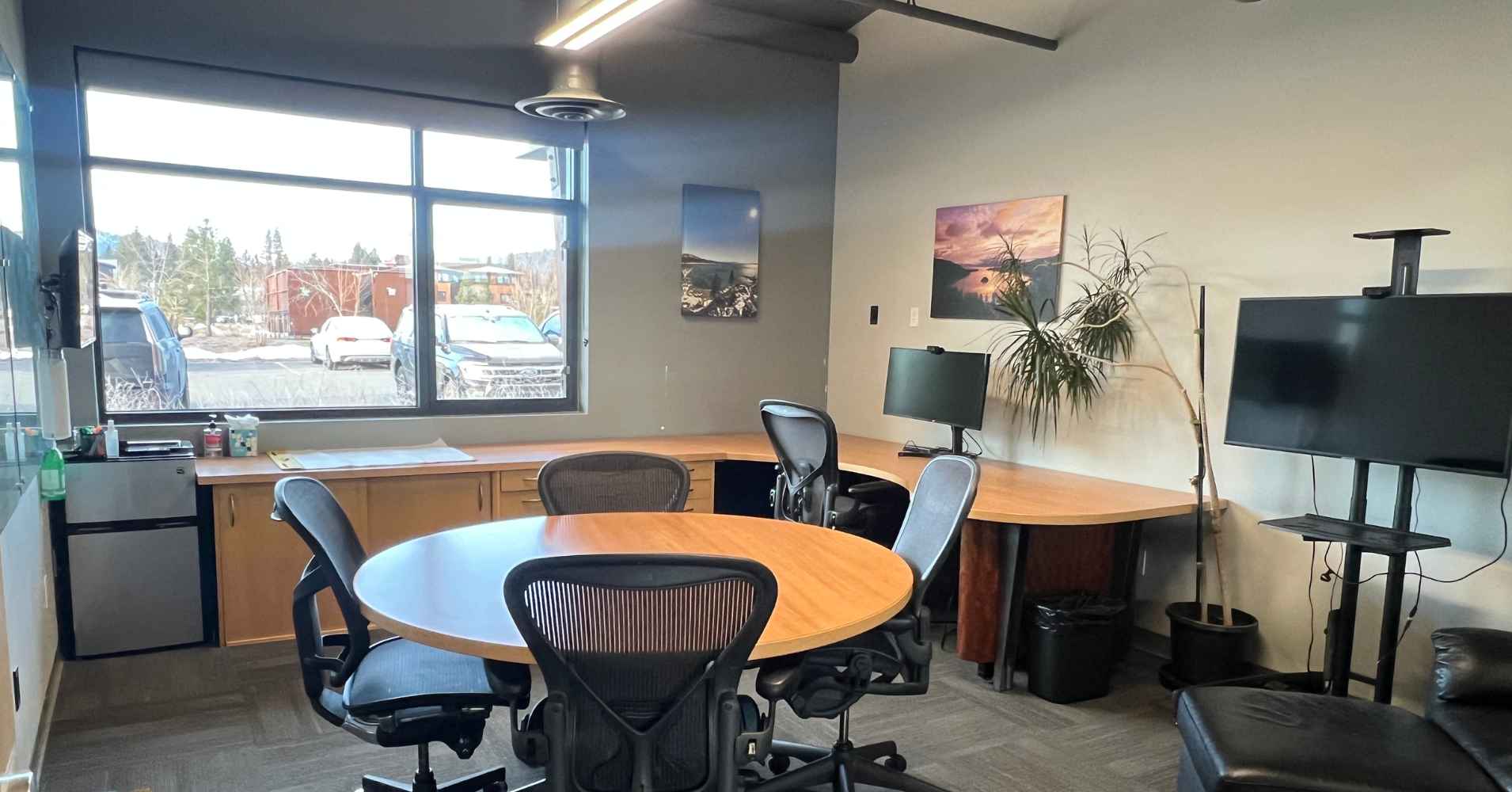 Modern conference room with whiteboard and AV equipment