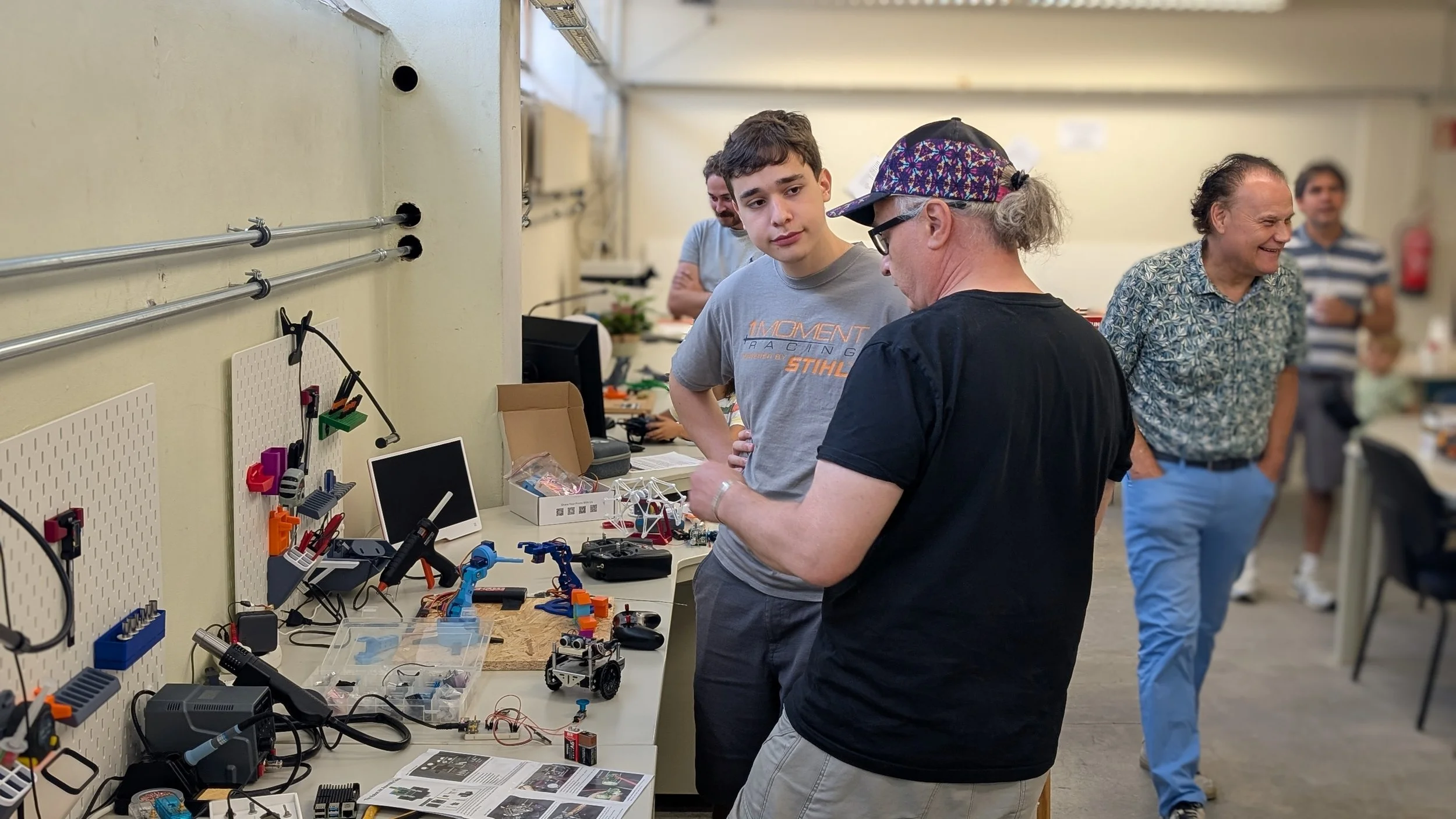 Community members working on projects in the workshop