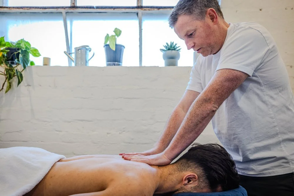 Jay treating a client