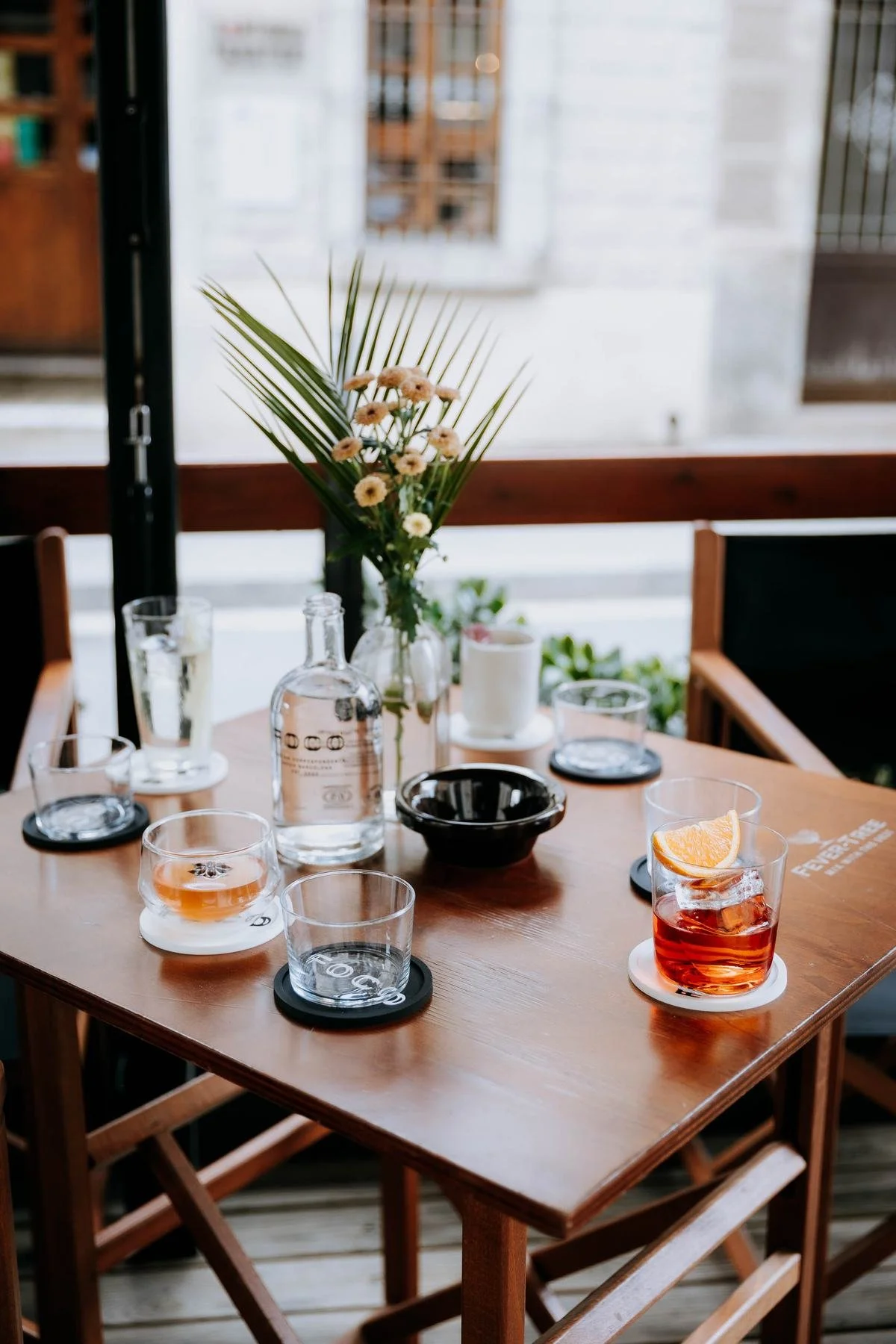 FOCO by day: white walls, big artwork and high tables.
