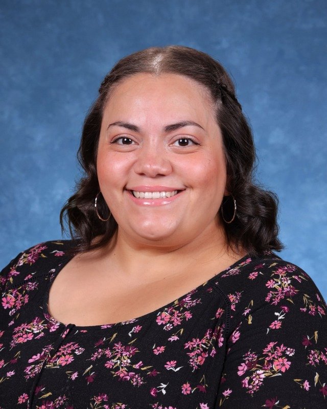 Picture of J. Guerrero-Rijo, Pupil Accounting Secretary, smiling warmly.