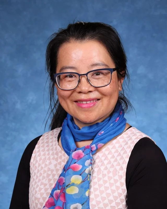 Picture of J. Guerrero-Rijo, Pupil Accounting Secretary, smiling warmly.