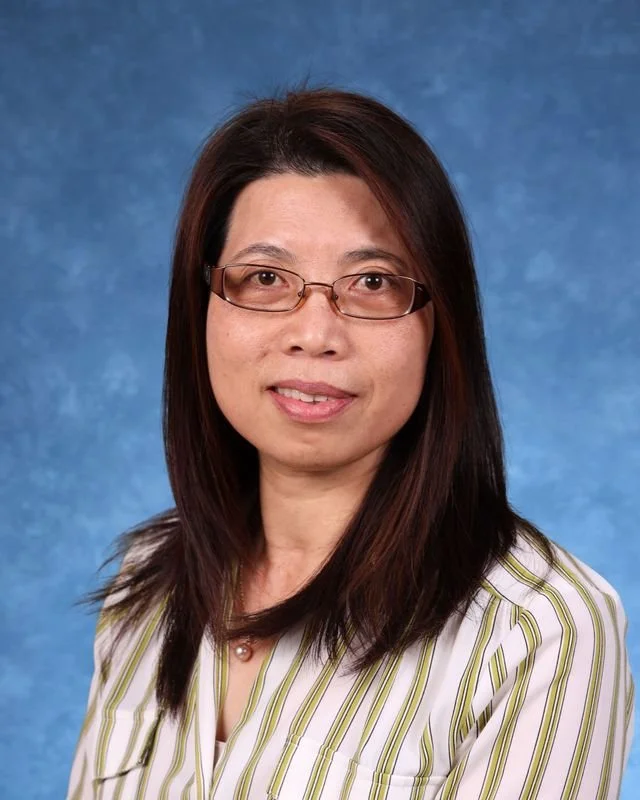 Picture of J. Guerrero-Rijo, Pupil Accounting Secretary, smiling warmly.