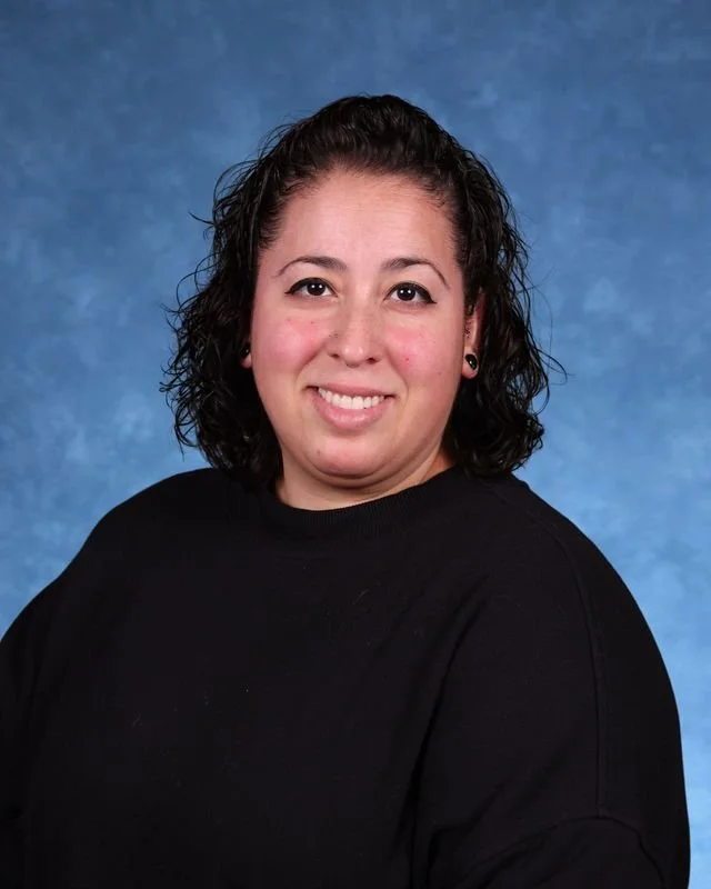 Picture of J. Guerrero-Rijo, Pupil Accounting Secretary, smiling warmly.