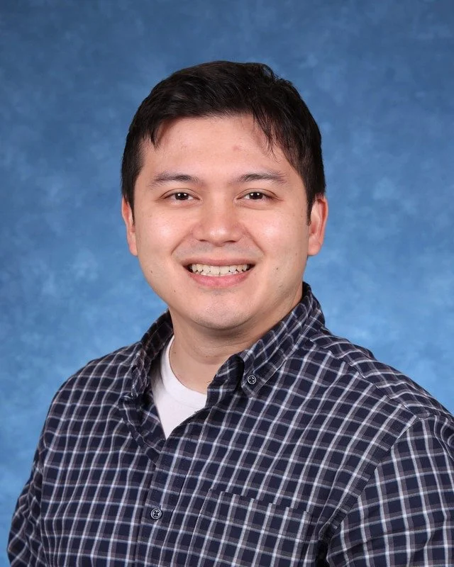 Headshot of H. Perdomo, Assistant Principal, with a professional demeanor.