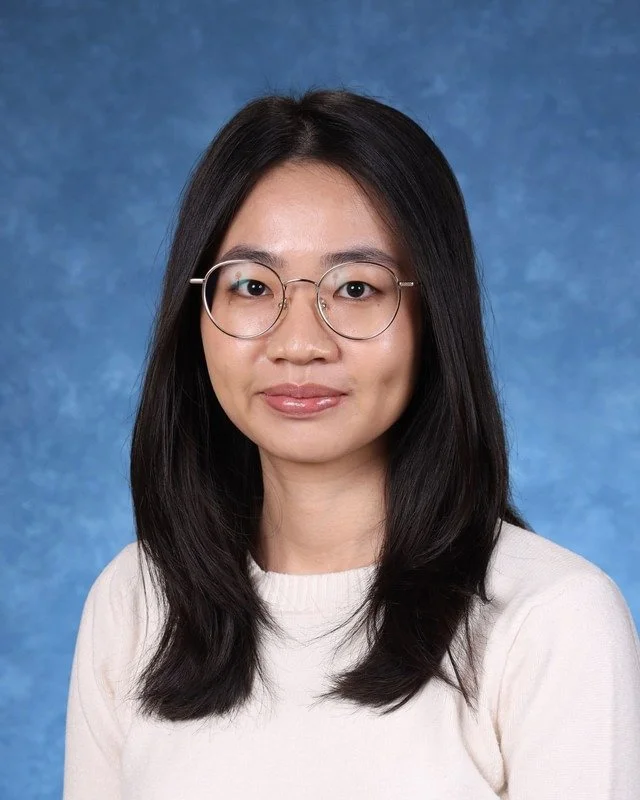 Headshot of H. Perdomo, Assistant Principal, with a professional demeanor.