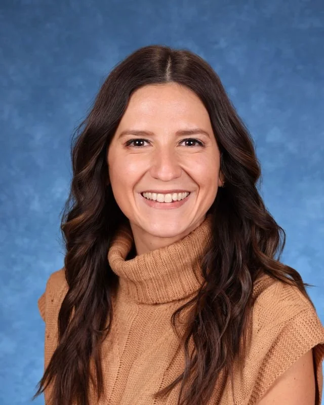 Picture of P. Rigas, smiling warmly.