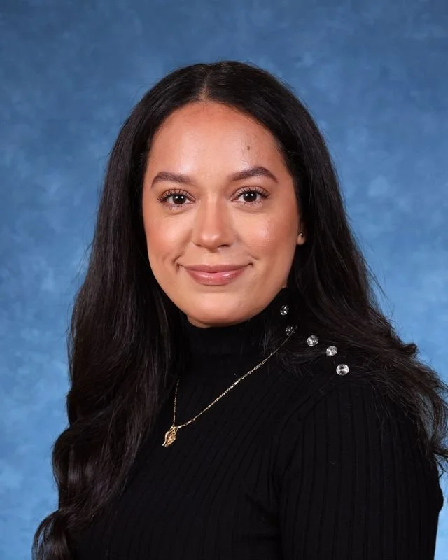 Headshot of H. Perdomo, Assistant Principal, with a professional demeanor.