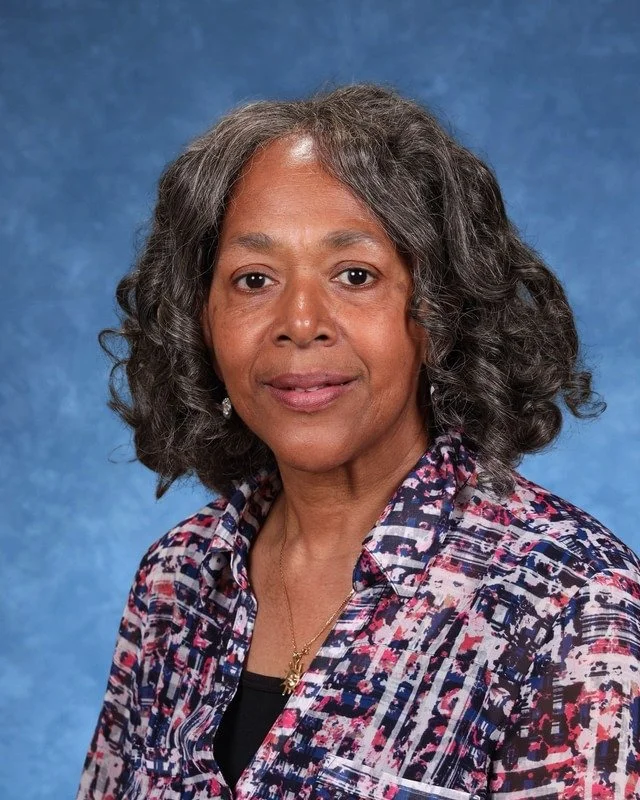 Headshot of H. Perdomo, Assistant Principal, with a professional demeanor.