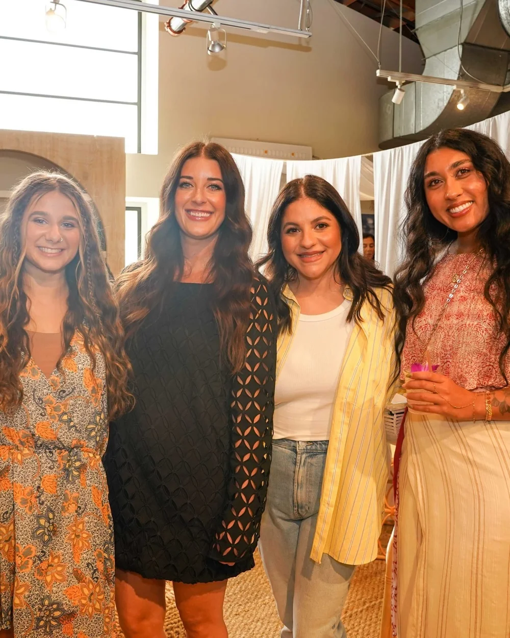 Four guests together at the launch party