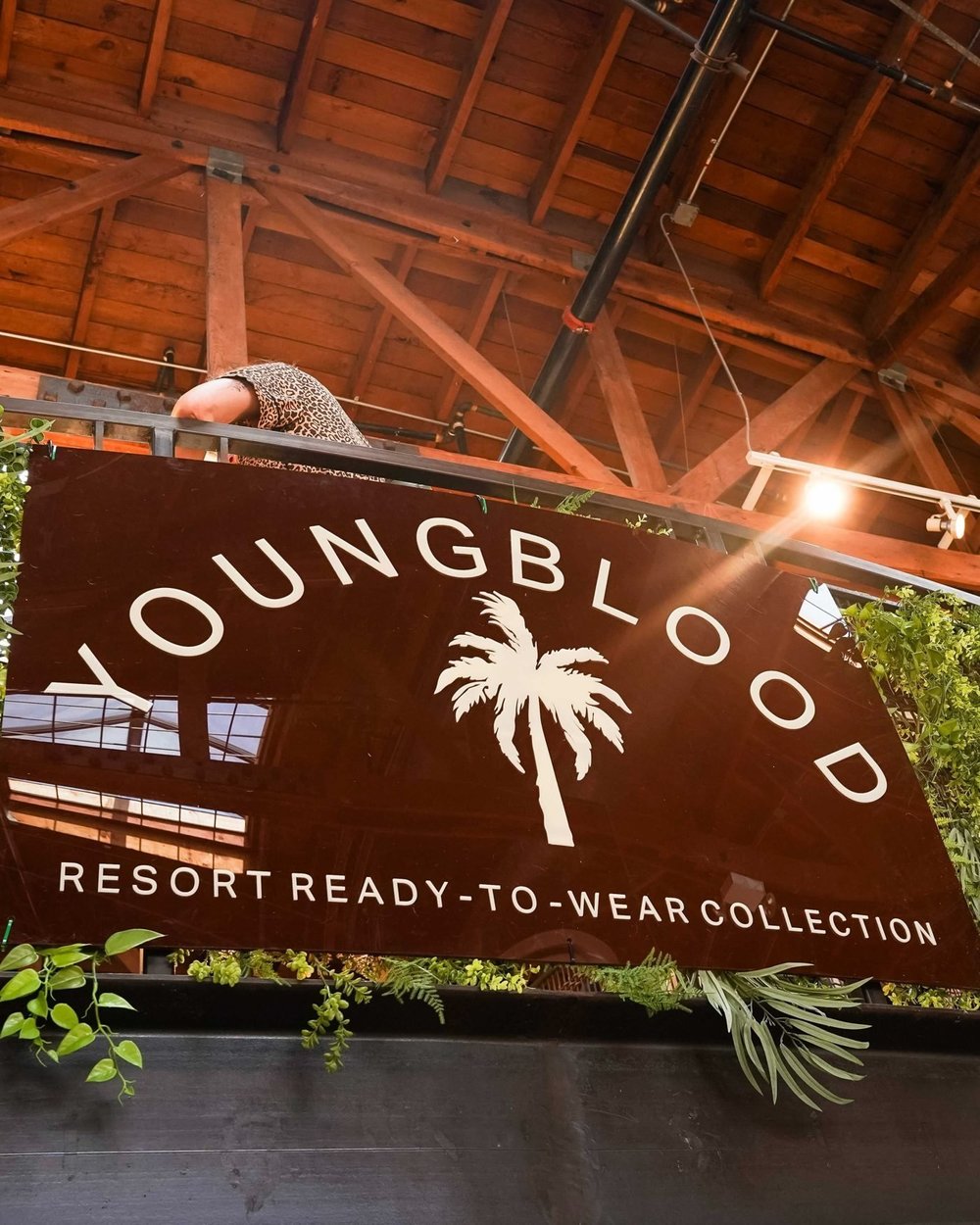 The Youngblood Resort Ready-To-Wear Collection sign over the launch party