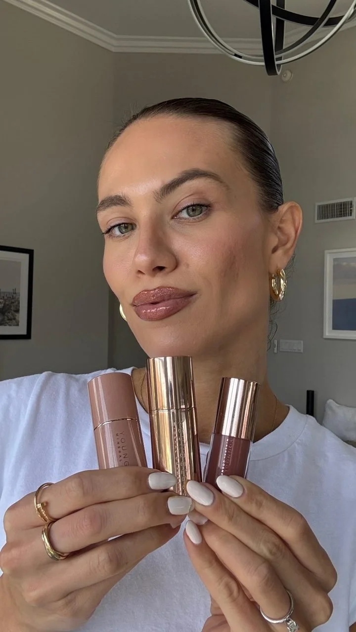 A creator holding three Youngblood sticks