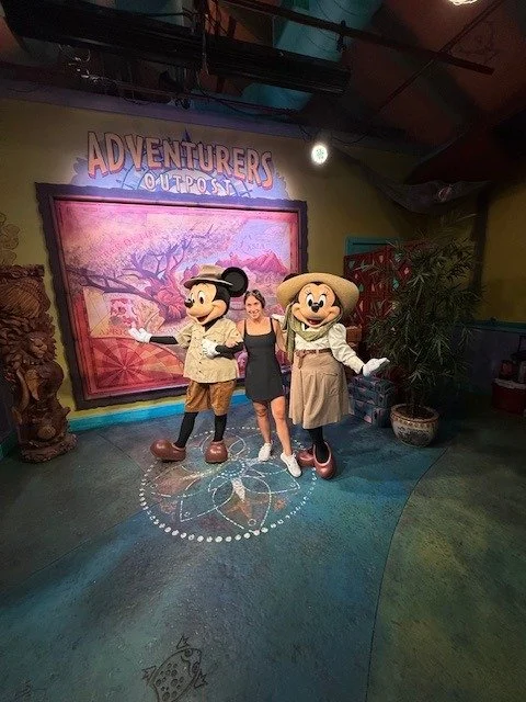 Alyssa LoVerso-Morgan with Mickey and Minnie at Adventurers Outpost in Animal Kingdom