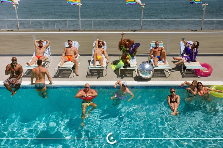VACAYA guests at a pool deck party on an all LGBTQ+ cruise