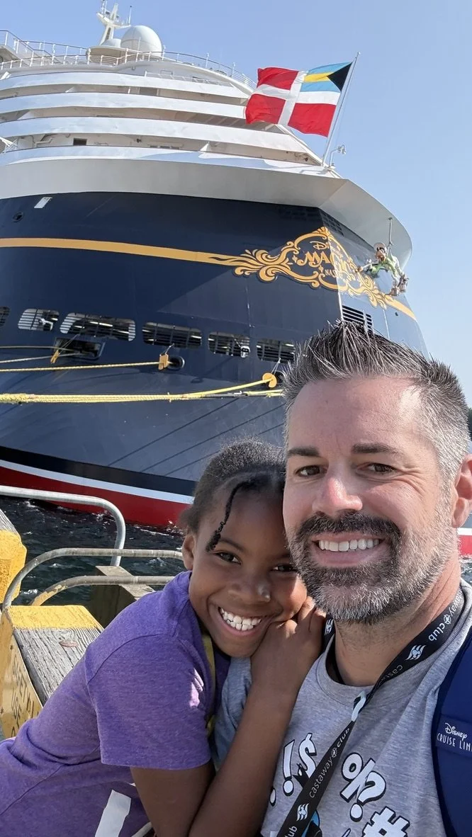 Piper Bryan and her Daddy Nick in front of the Disney Magic