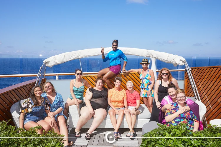 Women, transgender and nonbinary travelers relaxing on a VACAYA yacht