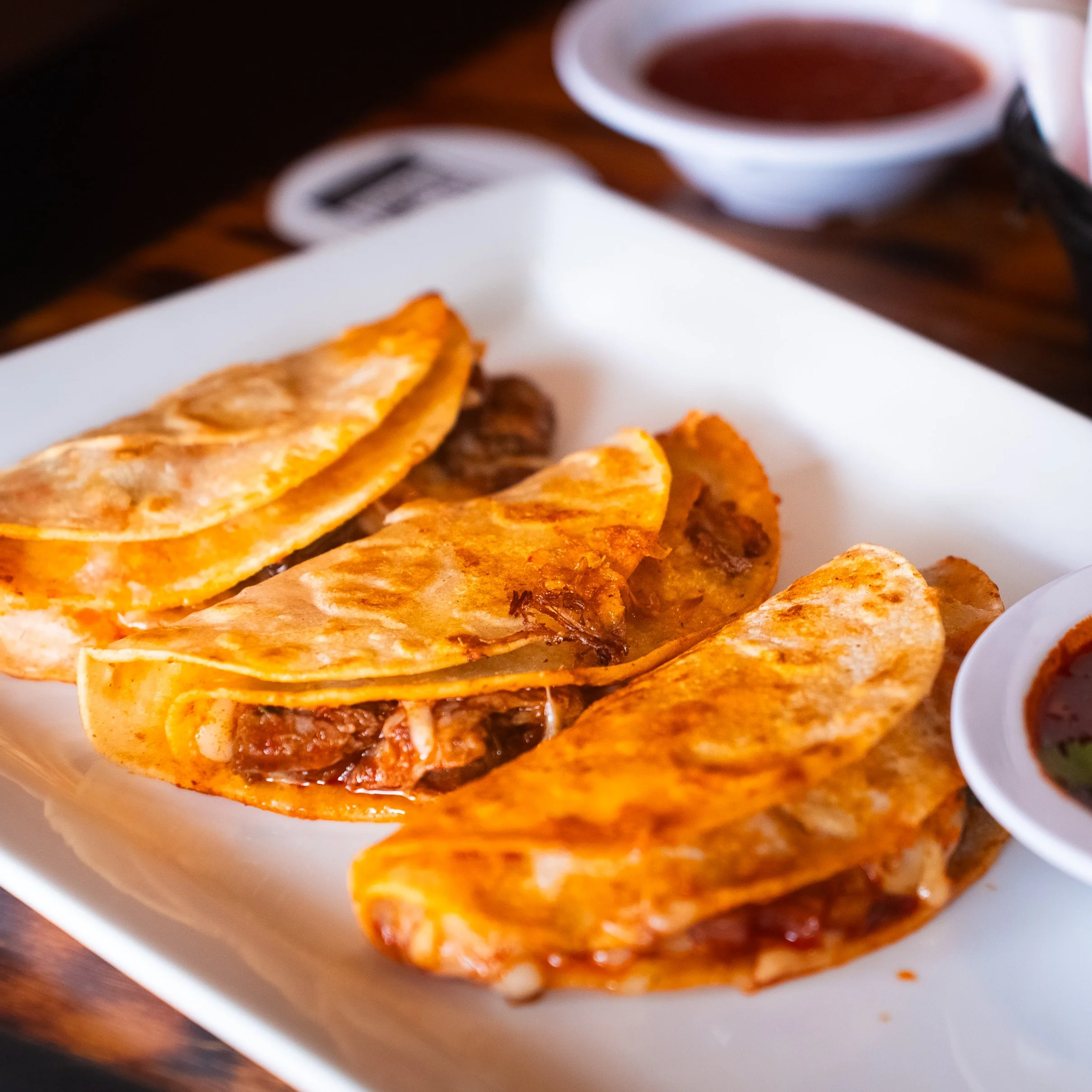 Birria tacos with rice, salsa and margarita