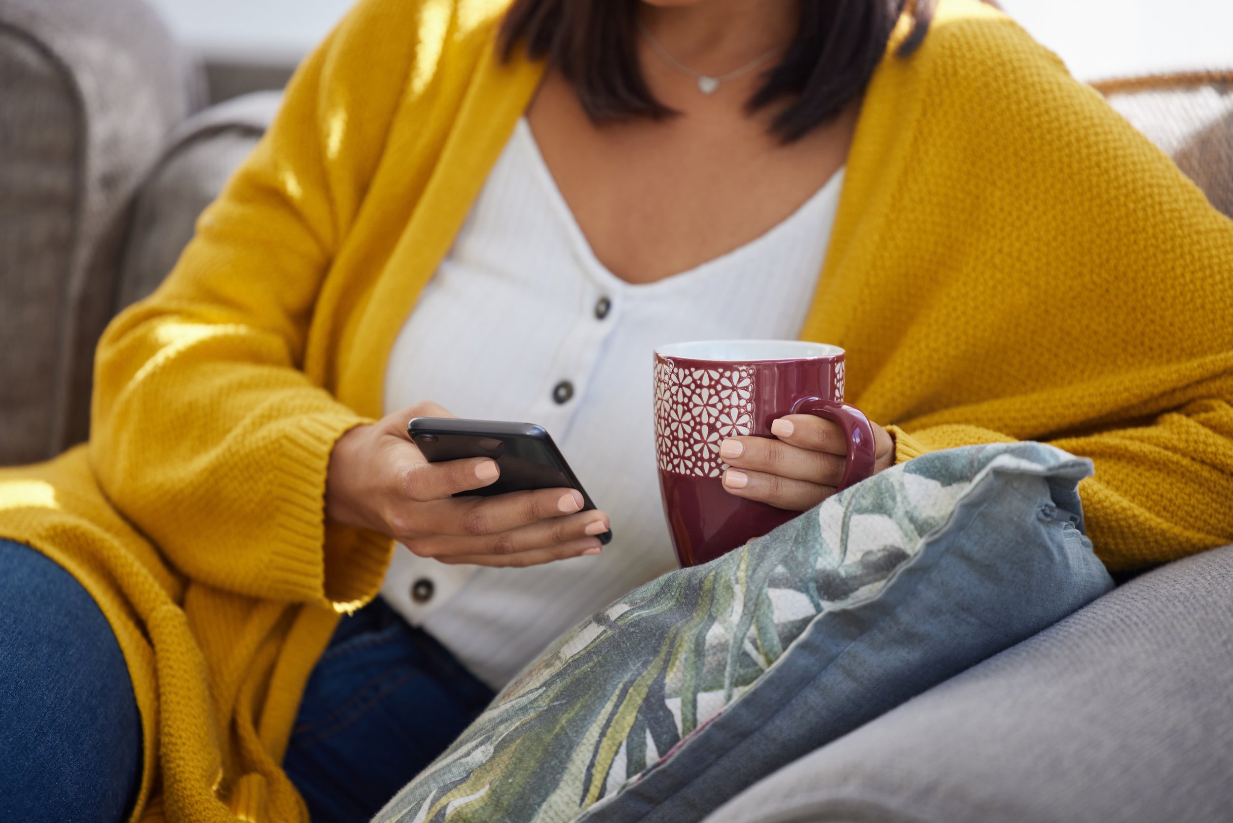 Woman taking weight loss surgery quiz on phone