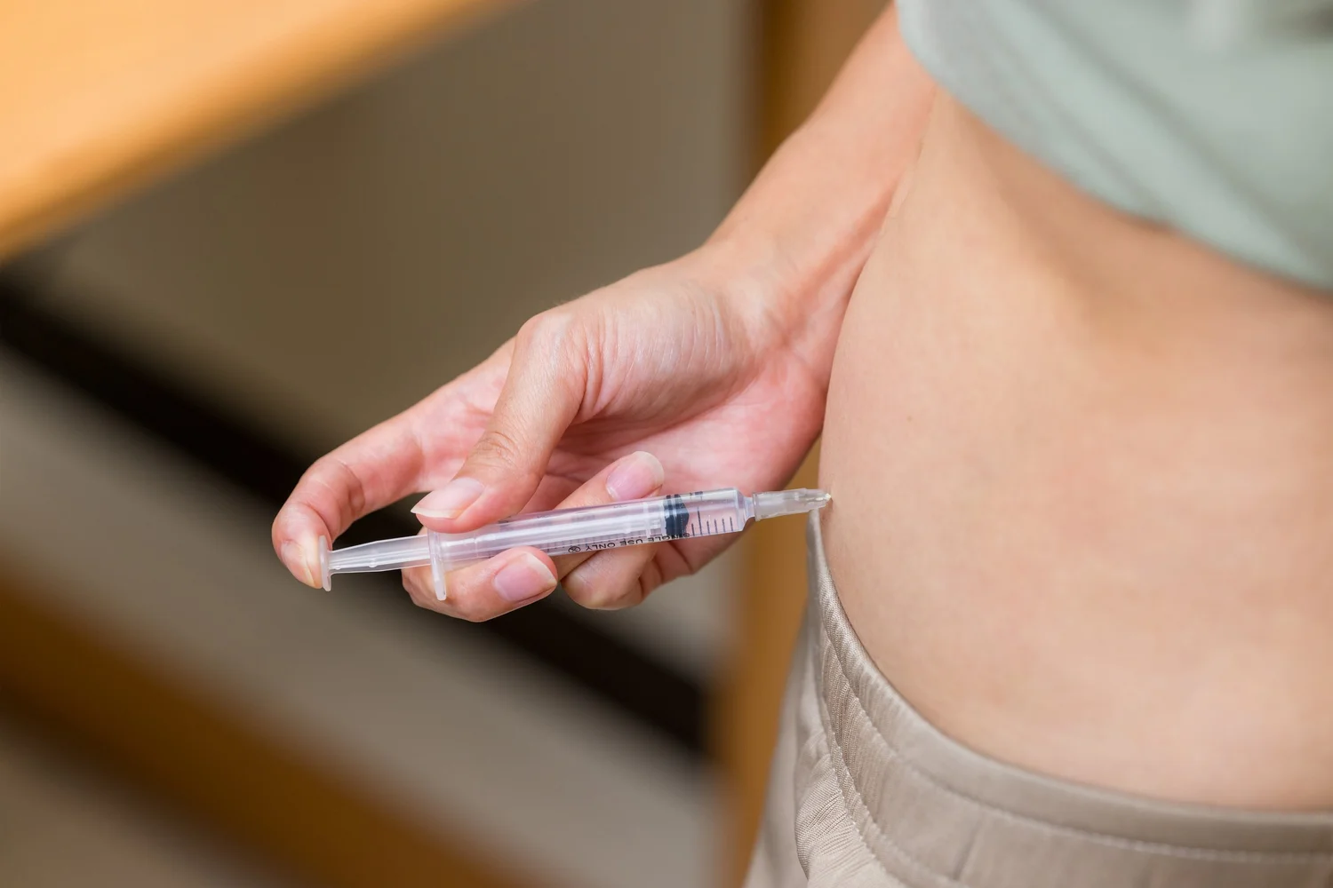 Patient receiving a weight-loss medication injection