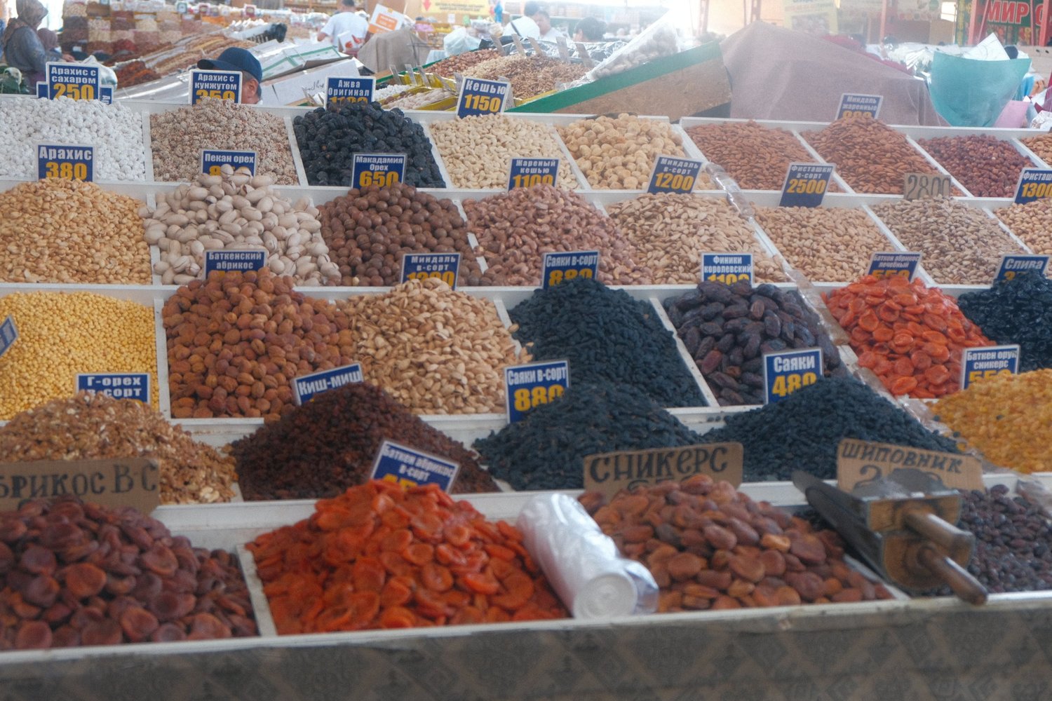 Dried apricots, raisins and nuts piled high at the Osh bazaar in Bishkek