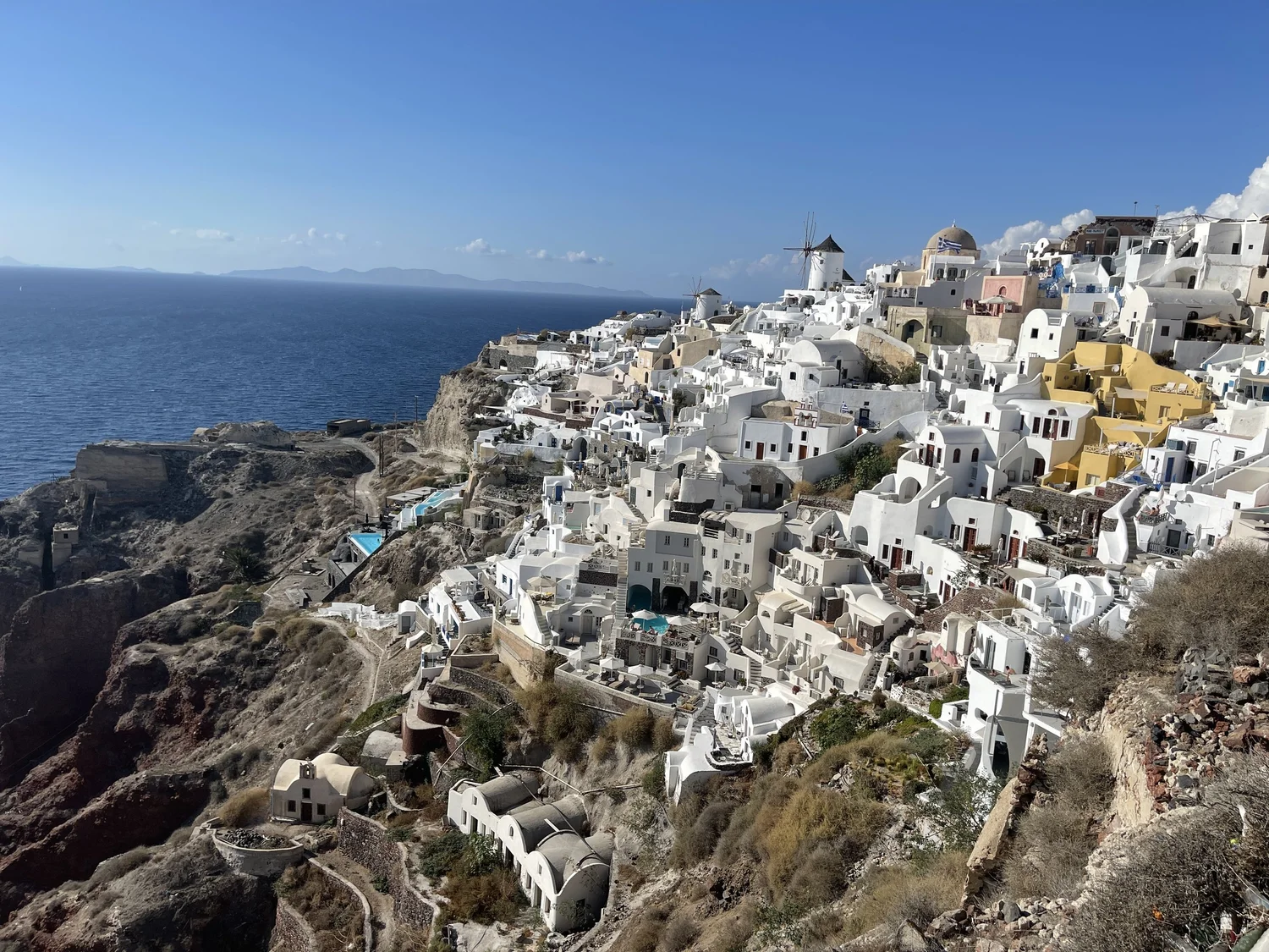 Whitewashed village of Oia on Santorini above the Aegean Sea