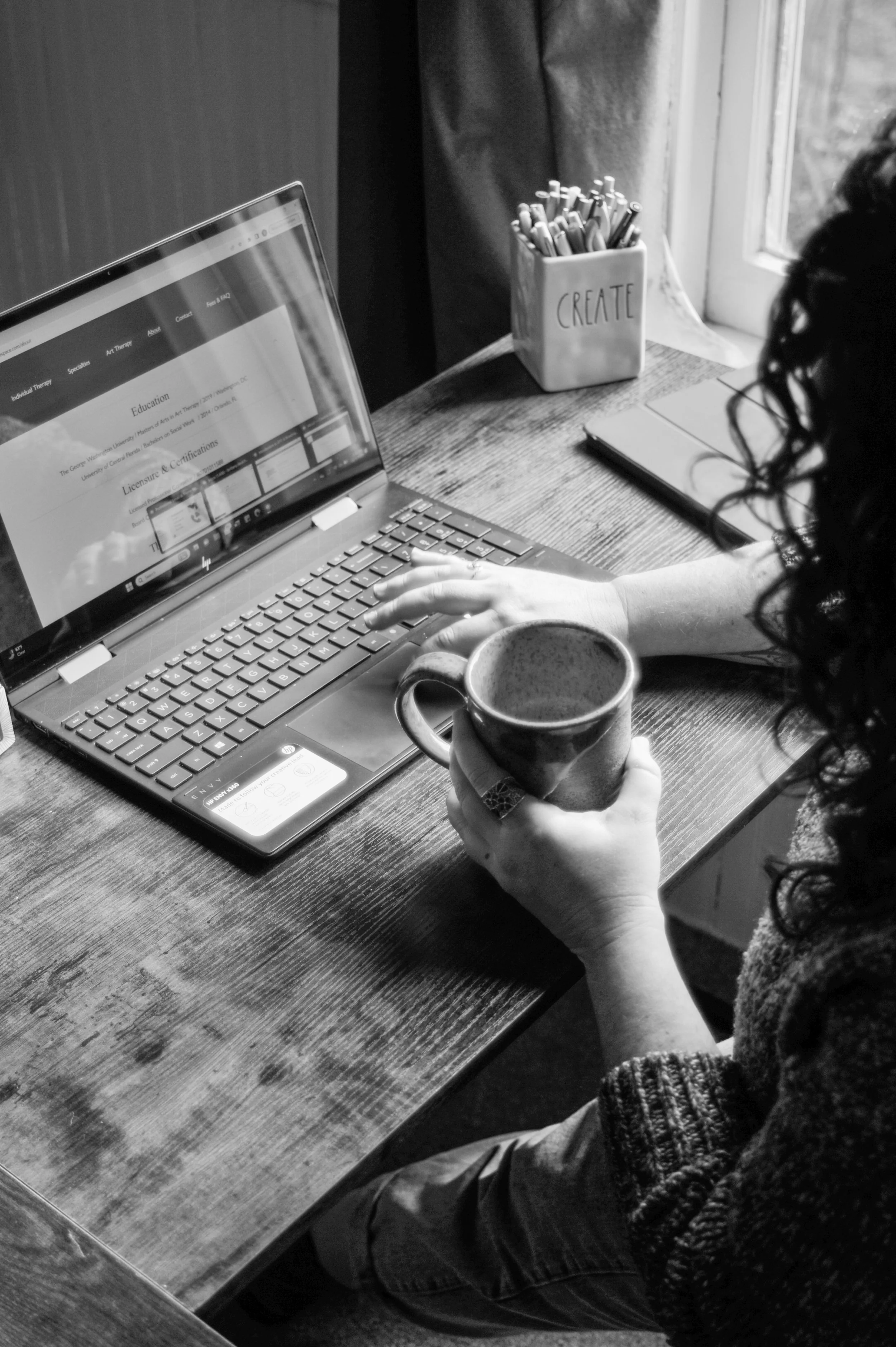 Brittany Deutch, LPC, ATR-BC preparing for an online virtual therapy session at Creative Source Counseling in Richmond, Virginia