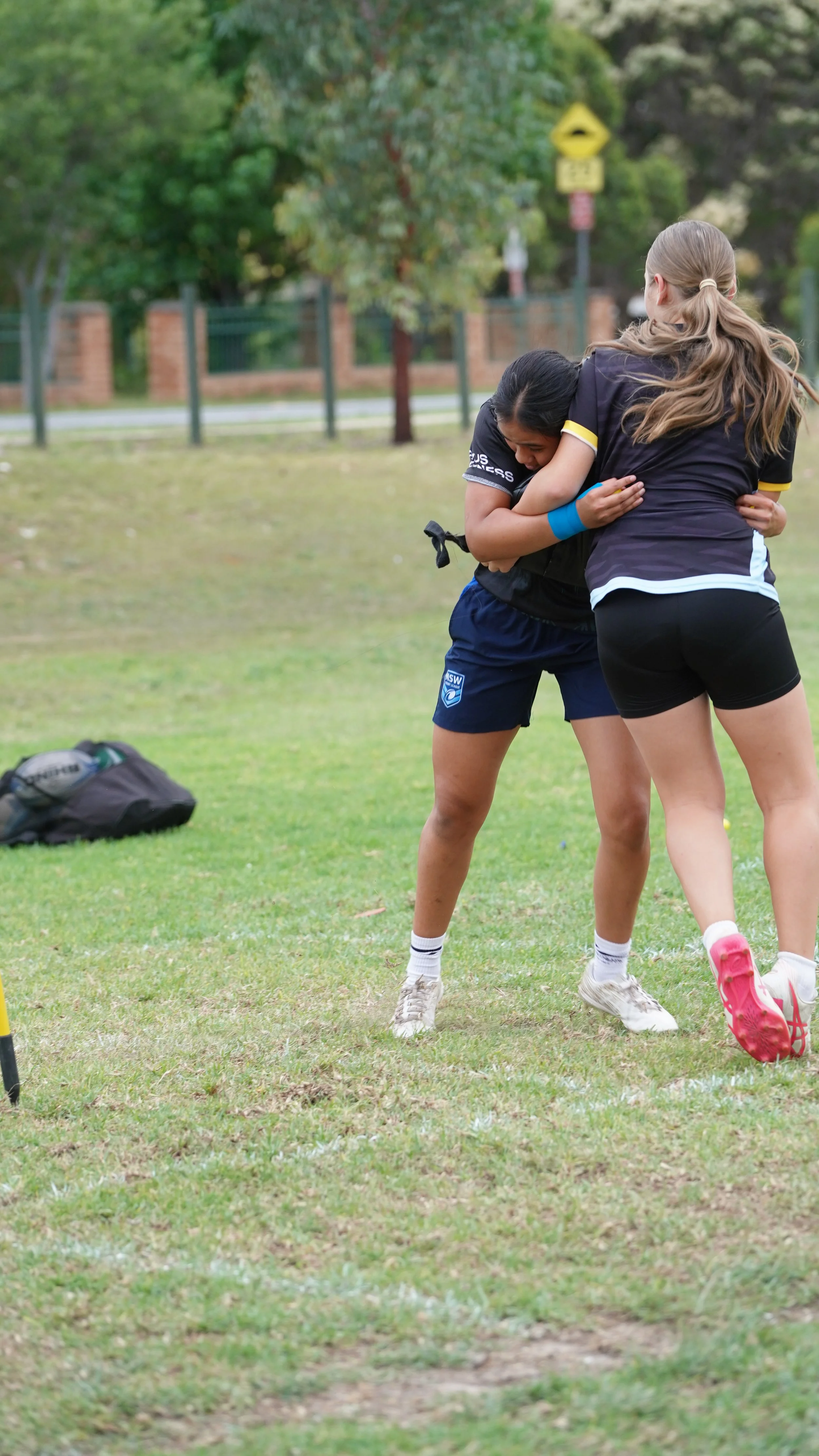 Two players practising a rugby league contact drill at S2S training